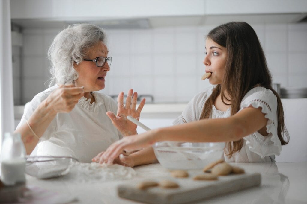 It's a common feeling among grandparents to want to be loved and appreciated by their grandchildren. However, sometimes things don't go as planned, and a grandchild may not show the affection or interest that their grandparent desires. This can be a tough situation to navigate, leaving grandparents wondering what they can do to improve their relationship with their grandchild. If you're a grandparent who finds themselves in this position, it's essential to understand that you're not alone. Many grandparents struggle with feeling disconnected from their grandchildren, and there are ways to work through this challenge. In this article, we'll explore some effective strategies for building a stronger bond with your granddaughter, even if she doesn't seem to like you at first. Key Takeaways Building a strong relationship with your granddaughter takes time and patience. Effective communication strategies can help bridge the gap between you and your granddaughter. Understanding your granddaughter's preferences and needs is key to strengthening your bond. Understanding the Situation When a grandparent feels that their granddaughter doesn't like them, it can be a difficult and emotional situation to navigate. It's important to understand the dynamics at play and what may be contributing to the strained relationship. One factor that may be at play is the parents' relationship with the grandparent. If there is tension or conflict between the parents and the grandparent, the granddaughter may be picking up on this and feeling uncomfortable around the grandparent. It's important for all parties involved to work on resolving any issues and creating a positive environment for the granddaughter. Another factor to consider is the granddaughter's emotions and feelings. It's possible that she is experiencing fear or uncertainty around the grandparent, especially if they don't see each other often. It's important to approach the situation with empathy and understanding, and to give the granddaughter time and space to build a relationship on her own terms. It's also important to consider the grandparent's own emotions and feelings. Rejection can be a painful experience, and it's important for the grandparent to take care of themselves and seek support if needed. It may also be helpful for the grandparent to examine their own behavior and see if there are any changes they can make to improve the relationship with their granddaughter. Overall, understanding the situation and the various factors at play can help the grandparent approach the situation with clarity and confidence. By working on improving relationships, managing emotions, and creating a positive environment, it's possible to build a strong and loving relationship with a granddaughter who may initially seem distant or uninterested. The Role of Time and Patience When it comes to building a strong relationship with a grandchild, time and patience are key. It's important to remember that every child is different and may take longer to warm up to a grandparent. It's also important to keep in mind that building a bond with a grandchild is a process that takes time and effort. One way to start building a bond with a grandchild is through play. Taking the time to engage in activities that the grandchild enjoys can help to build trust and create positive memories. This can include playing games, reading books, or simply spending time together. It's also important to be patient and not force the relationship. Pushing too hard can create tension and make the grandchild feel uncomfortable. Instead, try to be present and available, but also give the grandchild space to come to you on their own terms. Over time, a strong bond can develop between a grandparent and grandchild. It's important to remember that this relationship is unique and can take time to develop. By being patient and taking the time to build a bond, a grandparent can create a meaningful and lasting relationship with their grandchild. Effective Communication Strategies Effective communication is key to building and maintaining any relationship, including the one between grandparents and their grandchildren. If a grandchild is showing signs of not liking their grandparent, it may be due to a breakdown in communication. Here are some communication strategies that may help improve the relationship: Active Listening: When communicating with a grandchild, it is important to actively listen to what they are saying. This means giving them your undivided attention, maintaining eye contact, and asking questions to clarify what they mean. By actively listening, you show your grandchild that you value their thoughts and opinions, which can help build trust and improve the relationship. Positive Language: Using positive language can help create a more welcoming and supportive environment for your grandchild. Instead of criticizing or lecturing them, try using positive reinforcement and encouragement. This can help your grandchild feel more confident and valued, which can improve their overall attitude towards you. Respectful Approach: It is important to approach your grandchild with respect and understanding. Avoid making assumptions or jumping to conclusions about their behavior. Instead, try to understand their perspective and validate their feelings. This can help create a more open and honest dialogue between you and your grandchild. Conflict Resolution: Conflict is inevitable in any relationship, but it is important to handle it in a healthy and productive way. When conflicts arise between you and your grandchild, try to approach the situation calmly and with an open mind. Listen to their concerns and work together to find a solution that works for both of you. Grandparenting Tips: Finally, it is important to remember that grandparenting is a unique role that requires patience, understanding, and flexibility. Here are some tips to keep in mind: Be available and present in your grandchild's life, but also respect their boundaries and independence. Show your love and affection in ways that your grandchild is comfortable with. Be a positive role model and set a good example for your grandchild. Finally, remember that building a strong relationship takes time and effort, but the rewards are well worth it. Understanding Your Granddaughter's Preferences It can be disheartening when your granddaughter doesn't seem to enjoy spending time with you. However, it's important to understand that children have their own preferences and personalities, and it's not necessarily a reflection of your relationship with them. Preferences Your granddaughter may have certain preferences when it comes to activities, foods, or even people. It's important to respect her preferences and not take it personally if she doesn't want to do something you suggest. Instead, try to find common ground and activities that you both enjoy. Kids Children go through phases and can be fickle in their likes and dislikes. It's possible that your granddaughter's preferences towards you may change over time. It's important to continue to show love and support, even if it doesn't seem reciprocated at the moment. Distance Some children may feel uncomfortable with physical closeness, especially with people they don't see often. It's important to respect your granddaughter's personal space and not force physical affection. Instead, try to connect with her through conversation and shared activities. Comfort Your granddaughter may feel more comfortable with certain people or in certain environments. It's important to create a welcoming and comfortable space for her when she visits. This can include having her favorite snacks or toys on hand. Strong Smells Some children may be sensitive to strong smells, such as perfume or cologne. It's important to avoid wearing strong scents when spending time with your granddaughter, as it may make her uncomfortable. Hats Some children may feel intimidated or uncomfortable around people wearing hats. If you regularly wear a hat, consider taking it off when spending time with your granddaughter to help her feel more at ease. Remember, it's important to be patient and understanding when it comes to your granddaughter's preferences. By respecting her individuality and finding common ground, you can strengthen your relationship over time. Dealing with Rejection Experiencing rejection from a loved one can be a difficult and overwhelming situation. It is natural to feel guilty or responsible for the rejection, but it is important to understand that rejection is not always personal. Sometimes, people reject others due to their own issues or struggles, and it has nothing to do with the person being rejected. Processing rejection can take time and effort. It is important to allow oneself to feel the emotions that come with rejection, whether it be sadness, anger, or confusion. It is also important to seek support from friends, family, or a therapist to help process these emotions and move forward. If a grandparent is experiencing rejection from their grandchild, it is important to approach the situation with sensitivity and understanding. It may be helpful to have an open and honest conversation with the grandchild to understand their perspective and work towards finding a solution. It is also important for the grandparent to take care of themselves and not become overwhelmed by the rejection. This may involve practicing self-care, setting boundaries, and seeking support from others. Overall, dealing with rejection can be a challenging experience, but it is important to remember that it is not a reflection of one's worth or value as a person. With time, support, and understanding, it is possible to move forward and find resolution. Establishing Boundaries and Rules When a grandchild doesn't like their grandparent, it can be a difficult situation for everyone involved. In some cases, it may be due to a lack of boundaries or rules being established. Grandparents may be more lax in their approach to discipline compared to parents, which can lead to confusion and frustration for the child. To address this issue, it's important for grandparents to establish clear boundaries and rules with their grandchildren. This can help create a sense of structure and consistency, which can be beneficial for both the child and grandparent. When establishing boundaries and rules, it's important to be confident and knowledgeable in your approach. Grandparents should consider the child's age and developmental stage, as well as any specific needs or challenges they may be facing. Some tips for establishing boundaries and rules with grandchildren include: Clearly communicate expectations: Grandparents should clearly communicate their expectations to their grandchildren, such as what behavior is acceptable and what is not. This can help prevent misunderstandings and confusion. Be consistent: Consistency is key when it comes to discipline. Grandparents should be consistent in enforcing rules and consequences, which can help children understand the importance of following rules. Use positive reinforcement: Grandparents can also use positive reinforcement, such as praise and rewards, to encourage good behavior. This can help create a positive and supportive environment for the child. Respect the parent's wishes: It's important for grandparents to respect the parent's wishes when it comes to discipline and rules. Grandparents should work together with the parents to establish consistent rules and consequences for the child. By establishing clear boundaries and rules, grandparents can help create a positive and supportive environment for their grandchildren. This can help improve the relationship between grandparent and grandchild, and create a more harmonious family dynamic. The Impact of Divorce on Grandparent-Grandchild Relationships Divorce can have a significant impact on grandparent-grandchild relationships, particularly when the relationship between the grandparent and their adult child is strained. When a divorce occurs, it can create tension and conflict within the family, which can lead to estrangement or a breakdown in communication between grandparents and grandchildren. One of the primary ways in which divorce can affect grandparent-grandchild relationships is through changes in custody arrangements. If the grandchild is no longer living with their parent, it can be difficult for the grandparent to maintain regular contact with them. In some cases, the grandparent may be completely cut off from the grandchild's life, which can be devastating for both parties. Another way in which divorce can impact grandparent-grandchild relationships is through changes in family dynamics. When a divorce occurs, it can create a sense of instability and uncertainty for everyone involved. This can make it difficult for grandparents to know how to interact with their grandchildren, particularly if they are unsure of how their adult child feels about the situation. In addition, divorce can also lead to changes in the way that grandparents are perceived by their grandchildren. If the grandparent was close to both their adult child and grandchild before the divorce, but the relationship with the adult child has deteriorated, it can be difficult for the grandchild to know how to feel about their grandparent. They may feel torn between loyalty to their parent and their love for their grandparent. Overall, the impact of divorce on grandparent-grandchild relationships can be significant, particularly when the relationship between the grandparent and their adult child is strained. While there is no one-size-fits-all solution to this problem, it is important for grandparents to remain patient and understanding, and to do their best to maintain a positive relationship with their grandchildren, even in the face of difficult circumstances. Navigating Emotional Triggers When a grandchild expresses dislike towards their grandparent, it can be a triggering experience for the grandparent. It is important to understand that emotions can run high in situations like these, and it is crucial to navigate them in a healthy way. One of the first steps in navigating emotional triggers is to identify what is causing the trigger. Is it fear of rejection? Is it disappointment? Is it a feeling of inadequacy? Once the trigger is identified, it is easier to work through the emotions that arise. It is also important to acknowledge the emotions that are being felt. It is okay to feel hurt, sad, or angry when a grandchild expresses dislike. However, it is important to process these emotions in a healthy way. This can include talking to a trusted friend or family member, journaling, or seeking professional help. When a grandchild cries or expresses fear towards a grandparent, it is important to approach the situation with empathy and understanding. It is important to validate their feelings and let them know that their emotions are heard and understood. In some cases, it may be helpful to seek the guidance of a family therapist or counselor. They can provide strategies for navigating difficult emotions and improving communication within the family. Overall, navigating emotional triggers when a grandchild expresses dislike towards a grandparent can be a challenging experience. However, with patience, empathy, and understanding, it is possible to work through these emotions in a healthy and productive way. The Role of Gifts and Rewards Gifts and rewards can play a significant role in building a positive relationship between grandparents and their grandchildren. However, it is important to understand that gifts and rewards should not be used as a way to buy a child's affection or as a substitute for spending quality time with them. When it comes to gift-giving, it is important to keep in mind the child's interests and preferences. Grandparents should take the time to understand what their grandchildren like and dislike, and use this information to choose appropriate gifts. It is also important to set reasonable expectations and avoid overindulging the child with excessive gifts. Rewards can be a useful tool for encouraging positive behavior in children. However, rewards should be used sparingly and in conjunction with other positive reinforcement methods. Grandparents should avoid using rewards as a way to manipulate or control their grandchildren's behavior. Instead, rewards should be used as a way to reinforce positive behavior and encourage healthy habits. In the case of a granddaughter who doesn't like her grandparent, gifts and rewards may not be the solution. While they can be a way to show love and appreciation, they cannot replace the importance of spending quality time together and building a strong emotional connection. Grandparents should focus on finding ways to connect with their granddaughter on a deeper level, such as through shared interests or hobbies. Overall, gifts and rewards can be a helpful tool in building a positive relationship with grandchildren, but they should not be relied upon as the sole means of building a strong bond. Grandparents should focus on spending quality time with their grandchildren and finding ways to connect on a deeper level. Leveraging Technology for Bonding Technology has made it easier than ever to stay connected with loved ones, even when they are far away. For grandparents who may not live close to their grandchildren, leveraging technology can be a great way to bridge the distance and strengthen their relationship. One popular way to bond with grandchildren through technology is by using apps like FaceTime and Skype. These video chat platforms allow grandparents and grandchildren to see and hear each other in real-time, making it feel like they are in the same room together. Grandparents can use this time to catch up on what their grandchild has been up to, share stories, and even play games together. Another way to use technology for bonding is by sharing digital photo albums. Grandparents can create albums of family photos and share them with their grandchildren, allowing them to see pictures of family members they may not have met yet or relive precious memories together. Technology can also be used to plan virtual activities together. Grandparents can suggest watching a movie or TV show at the same time and discussing it over the phone or video chat. They can also play online games together or participate in virtual events like concerts or museum tours. Overall, technology can be a valuable tool for grandparents looking to bond with their grandchildren from a distance. By using video chat, sharing digital photo albums, and planning virtual activities together, grandparents can maintain a strong connection with their grandchildren even when they can't be physically present. Dealing with Criticism Criticism can be difficult to handle, especially when it comes from family members. When a grandchild expresses dislike towards a grandparent, it can be hurtful and confusing. However, it is important to remember that criticism is not necessarily a reflection of the grandparent's actions or character. Parents play a crucial role in the relationship between the grandparent and grandchild. It is important for grandparents to communicate with their adult child to understand the reasons behind the criticism. Perhaps there is a miscommunication or misunderstanding that can be resolved through open and honest communication. It is also important for grandparents to avoid being defensive or dismissive of the criticism. Instead, they should listen actively and try to understand the grandchild's perspective. This can help build trust and strengthen the relationship over time. When dealing with criticism, it may be helpful to focus on the positive aspects of the relationship and look for opportunities to improve it. Grandparents can also seek support from friends or a therapist to help them cope with the emotional impact of the criticism. In summary, dealing with criticism from a grandchild can be challenging, but it is important to approach the situation with an open mind and a willingness to listen. By communicating with the adult child and focusing on the positive aspects of the relationship, grandparents can work towards building a stronger connection with their grandchild. Frequently Asked Questions What to do when your granddaughter doesn't like you? It can be difficult when a grandchild doesn't seem to like you, but it's important to remember that children go through phases and may act differently towards different people at different times. It's important to be patient, understanding, and continue to show your love and support for your granddaughter. How do I get my granddaughter to like me? Building a relationship with your granddaughter takes time and effort. Start by spending quality time with her, doing things she enjoys, and showing interest in her life. Be patient, consistent, and loving, and let her know that you care about her and want to be a part of her life. Why does my 4 year-old granddaughter act mean to me? Four-year-olds are still learning how to regulate their emotions and communicate effectively. It's possible that your granddaughter may be acting out because she is feeling overwhelmed or frustrated. Try to remain calm and patient, and model positive behavior for her. Why does my 5 year old grandson not like me? It's important to remember that children have their own personalities and preferences. Your grandson may simply prefer spending time with other people or doing other activities. Try to find common interests and activities that you can enjoy together, and be patient and understanding. At what age do grandchildren lose interest in grandparents? There is no set age when grandchildren lose interest in their grandparents. It's important to continue to build and maintain a relationship with your grandchildren throughout their lives, even as they grow and change. Why does my granddaughter not want to hug me? Some children may not feel comfortable with physical affection, or may simply prefer other forms of showing love and affection. Respect your granddaughter's boundaries and preferences, and find other ways to show your love and support for her.