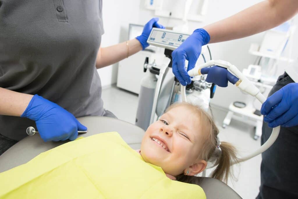 your childs first visit to the dentist what you need to know