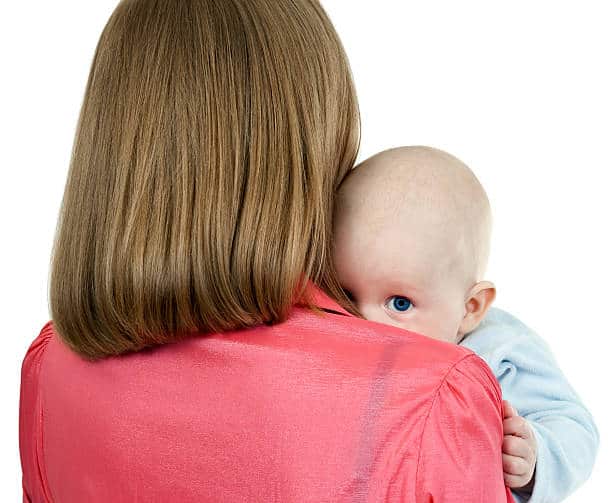 Baby Aggressively Rubbing Face into Shoulder