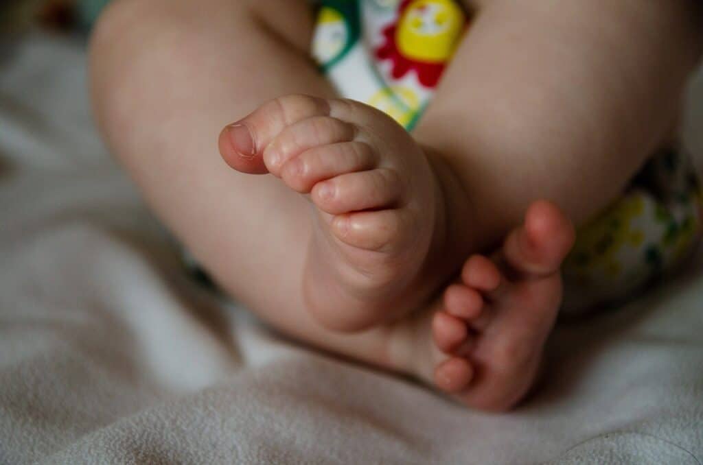Baby Stiffens Legs When Lying Down
