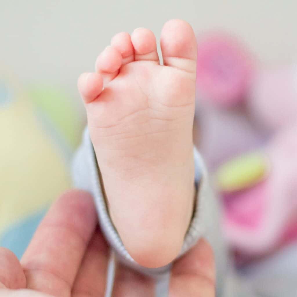 Baby Stiffens Legs When Lying Down