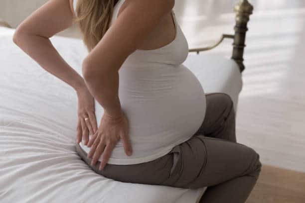 How to Safely Pop a Pregnant Woman’s Back